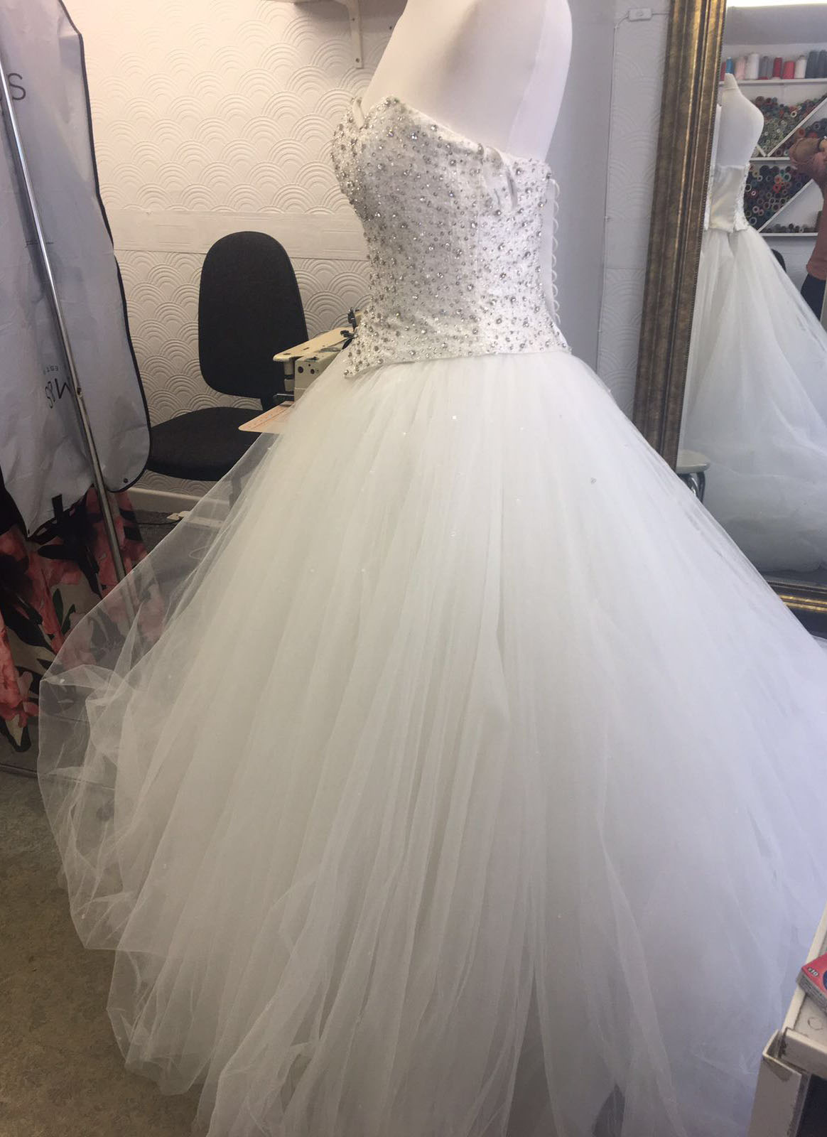 White tulle wedding ball gown with crystal-studded bodice