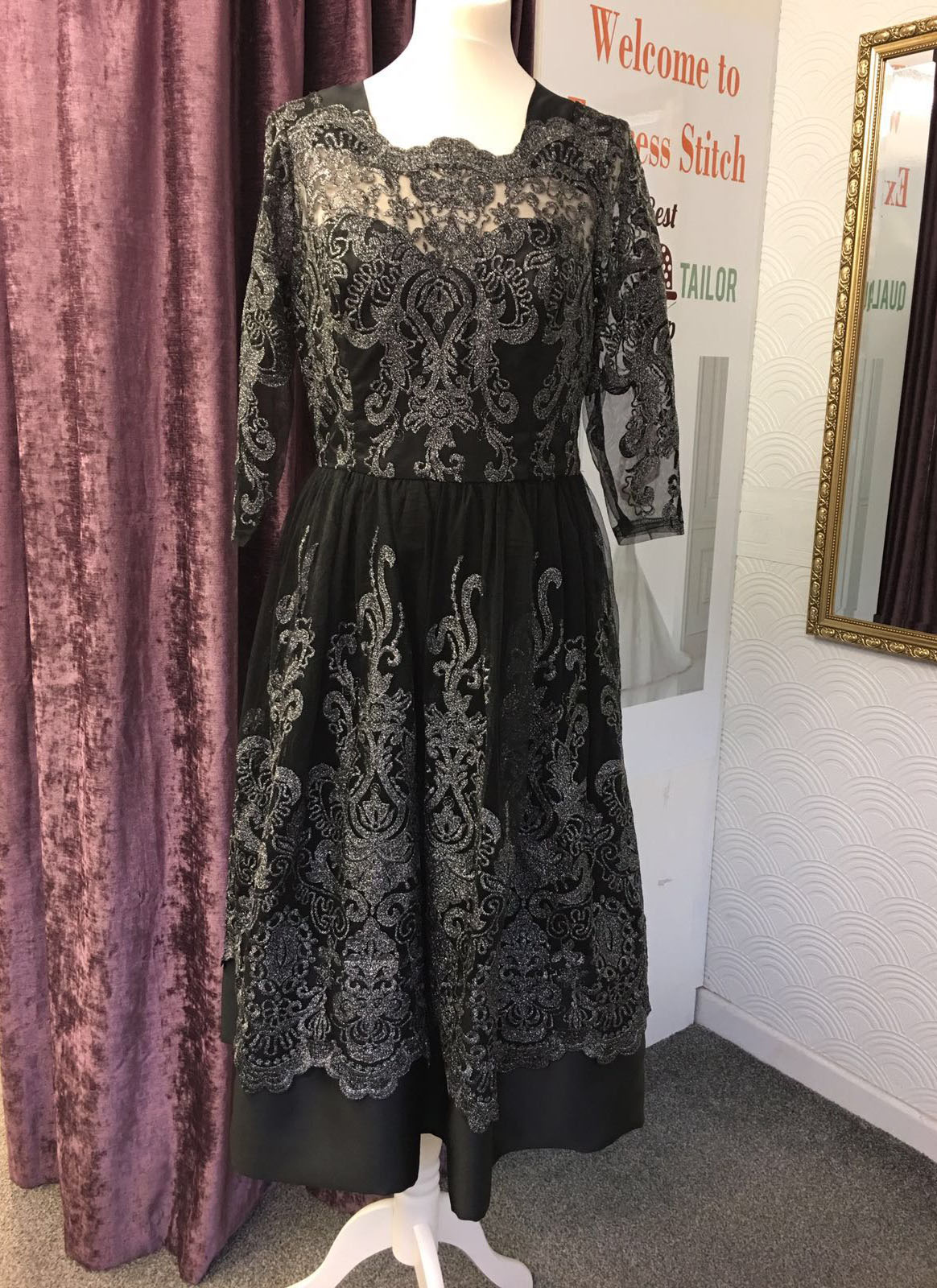 Black evening dress with silver lace overlay and baroque pattern